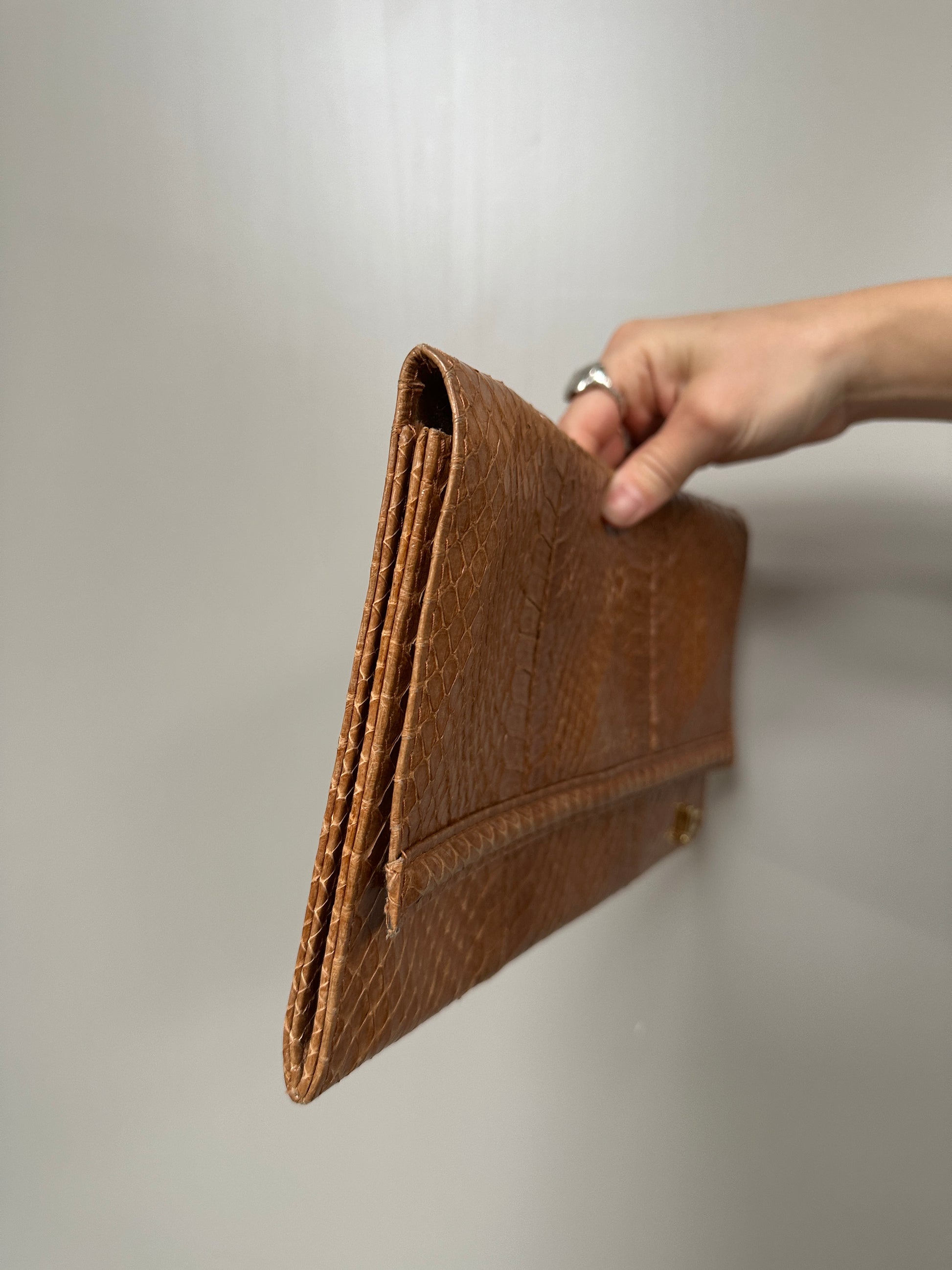 BROWN LEATHER CLUTCH BAG