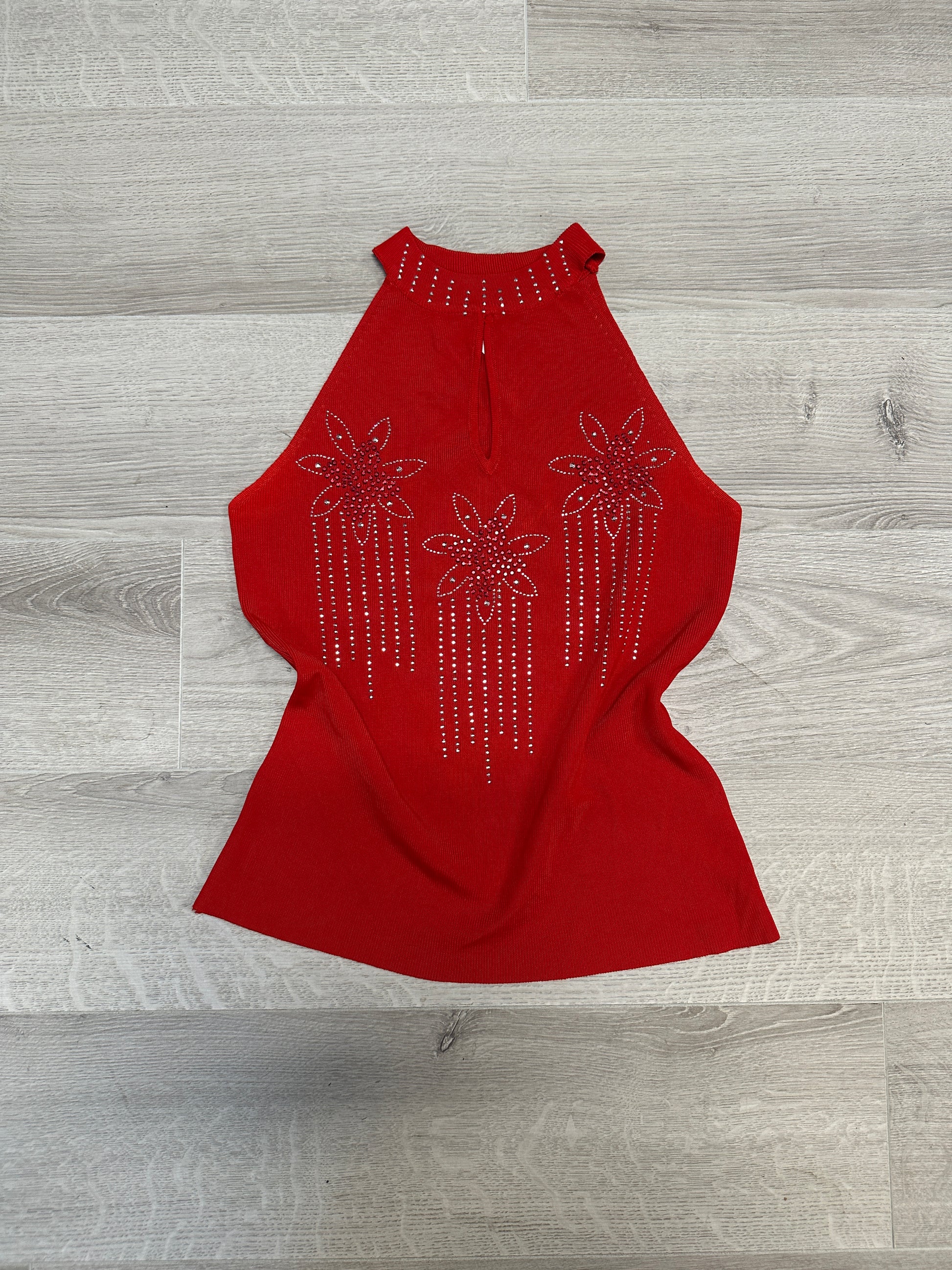 RED TOP WITH FLOWER DETAILS