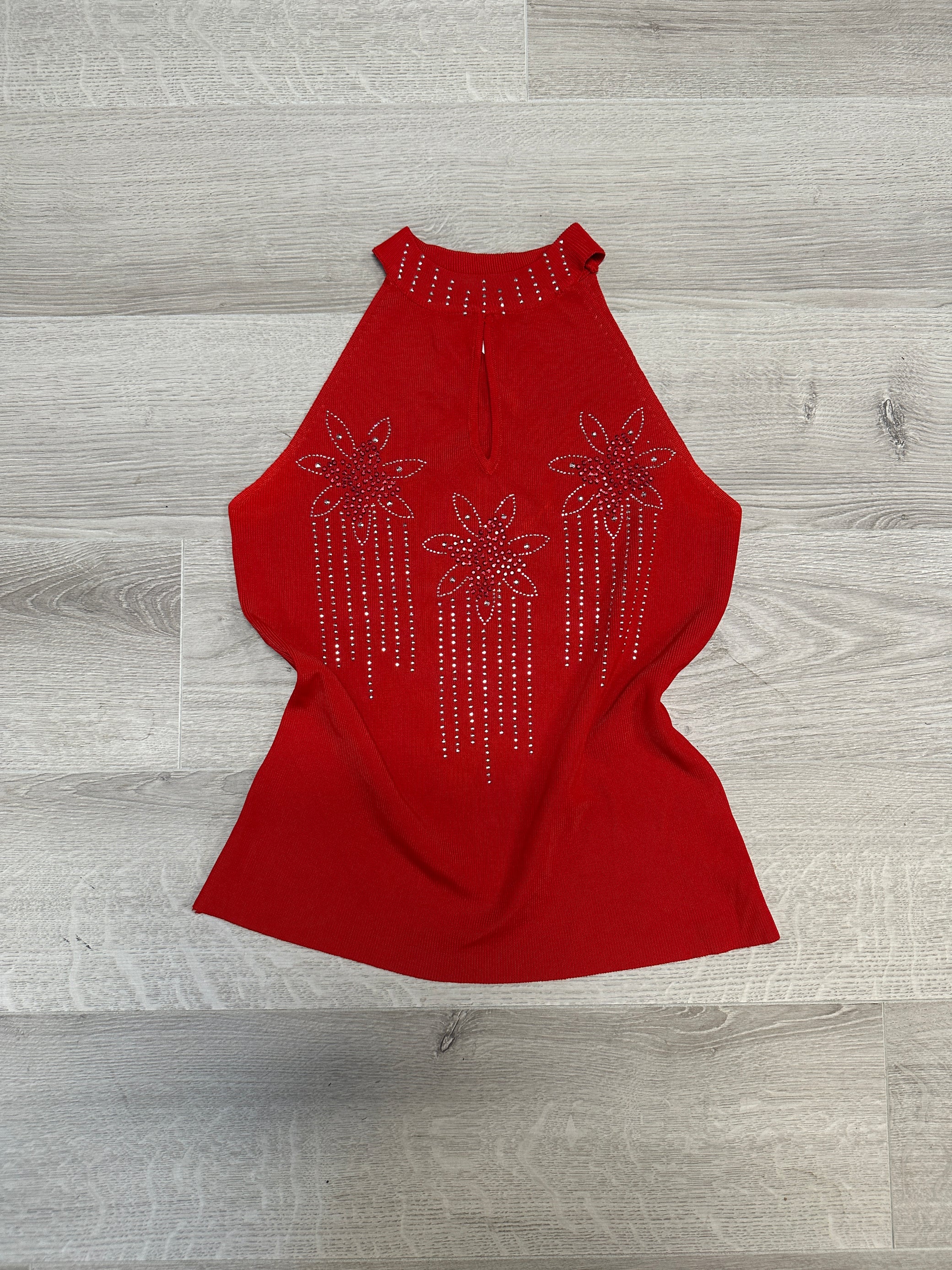 RED TOP WITH FLOWER DETAILS