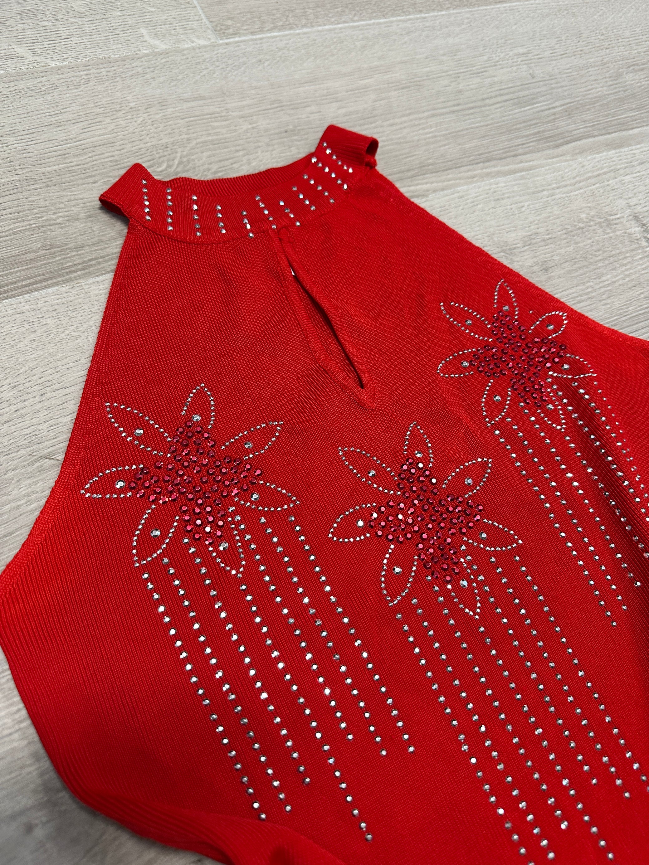 RED TOP WITH FLOWER DETAILS