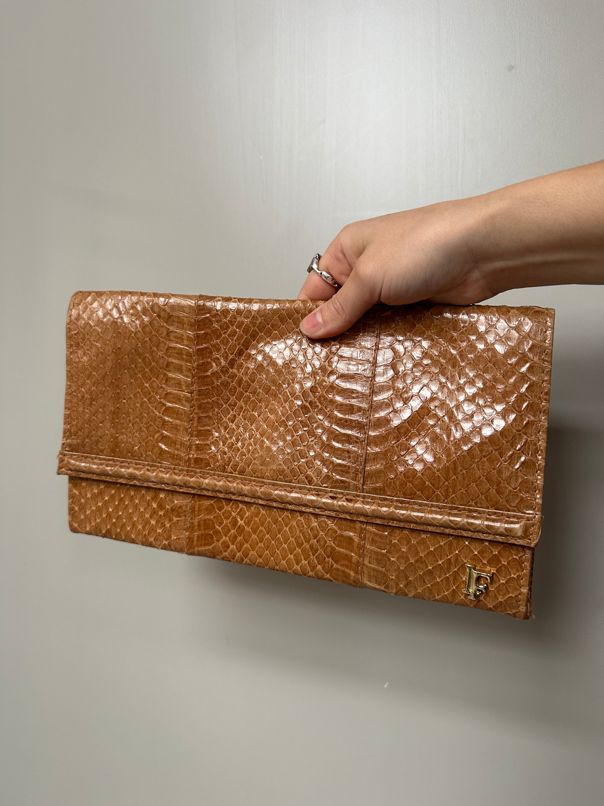 BROWN LEATHER CLUTCH BAG